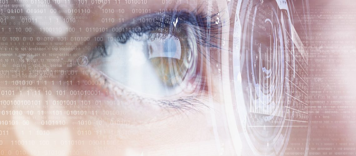 Close up of human eye on digital technology background